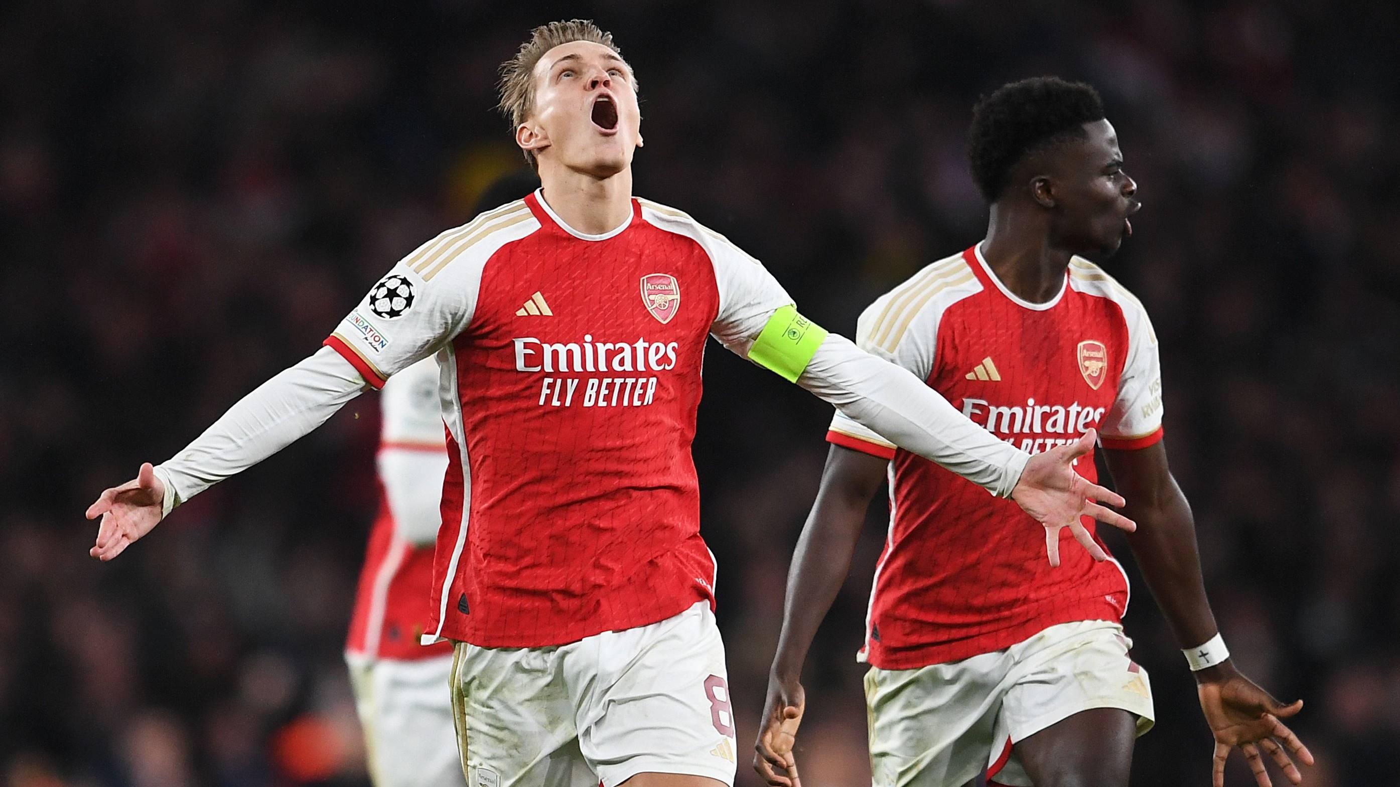 Selebrasi-kapten-Arsenal-Martin-Odegaard-yang-dinyatakan-lolos-ke-perempat-final-Liga-Champions.jpg