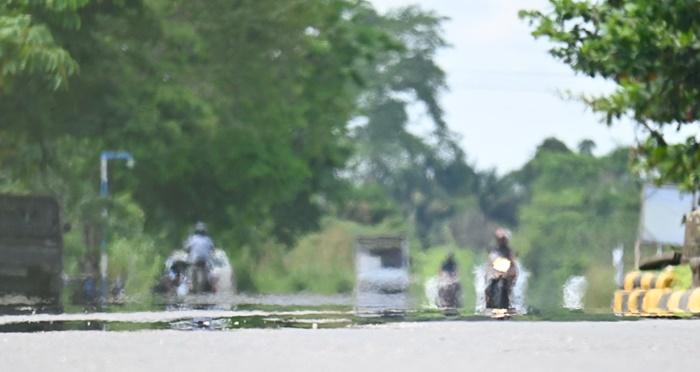 Uap-panas-permukaan-jalan-ditimbulkan-akibat-panas-fyjngh.jpg