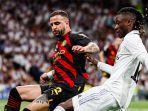 Duel-Kyle-Walker-dan-Eduardo-Camavinga-di-Liga-Champions-090523.jpg