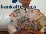 Ilustrasi-uang-dengan-emisi-2022-pecahan-seribu-rupiah-dtjgd.jpg