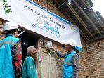 Kanan-ke-Kiri-Manager-PLN-UP3-Jember-Alimuddin-menyalakan-sambungan-baru.jpg
