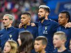 Olivier-Giroud-saat-membela-Timnas-Prancis-melawan-Austria-di-UEFA-Nations-League-2022.jpg