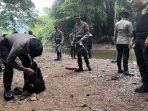Personel-Polres-Tana-Tidung-saat-sedang-membersihkan-objek-wisata-Gunung-Rian-dfb.jpg