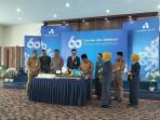 Prosesi-potong-tumpeng-dalam-HUT-Bank-KaltimTara.jpg