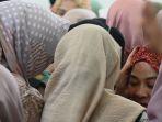 Ratusan-keluarga-menyambut-jemaah-yang-baru-pulang-berhaji-di-titik-penjemputan-rthf.jpg