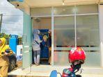 Suasana-mesin-ATM-Bank-KaltimTara-di-Pasar-Imbayud-drfh.jpg