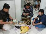 TNI-AL-menyerahkan-seorang-pria-WNA-Pakistan-dth.jpg