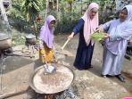 Tampak-tim-ibu-ibu-kompak-memasak-nasu-cemba-thrj.jpg