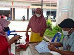 aktivitas-kegiatan-pembagian-beras-10-kilogram-bagi-kpm-program-bst-dan-pkh.jpg