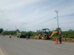 aktivitas-kendaraan-dump-truck-pengerjaan-jalan-di-malinau.jpg