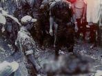 jasad-brigjen-soetojo-siswomiharjo-sesaat-setelah-diangkat-dari-sumur-di-lubang-buaya-300920.jpg