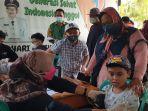 kegiatan-vaksinasi-covid-19-untuk-masyarakat-di-pos-dinas-kesehatan-bulungan.jpg