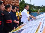 presiden-ri-joko-widodo-didampingi-ketua-umum-pssi-erick-thohir.jpg