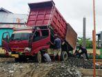 sejumlah-pekerjaburuh-sedang-melakukan-pekerjaan-kontruksi.jpg