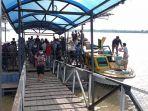 suasana-kedatangan-penumpang-pelabuhan-di-tana-tidung.jpg