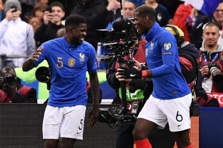 samuel-umtiti-paul-pogba-perancis-vs-islandia.jpg