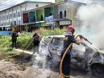 BN-kebakaran-mobil-di-Yos-4.jpg