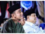 Gibran-Rakabuming-Raka-saat-bersama-Prabowo-Subianto-dalam-momen-sebuah-acara.jpg