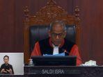 Hakim-MK-Saldi-Isra-saat-menyampaikan-perkara-Bupati-Barito-Utara.jpg
