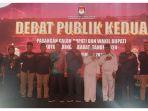 Ketua-KPU-Kobar-Chaidir-foto-bersama-dengan-dua-pasangan-calon-bupati-dan-wakil-bupati-Kobar.jpg