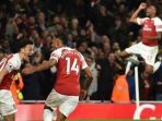 arsenal-pierre-emerick-aubameyang-kedua-dari-kiri-mesut-oezil_20181023_044558.jpg