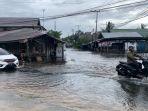 banjir-di-jalan-beliang-palangkaraya.jpg