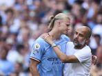 haaland-guardiola.jpg