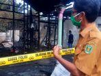kebakaran-di-kalsel-garis-polisi-terpasang-di-lokasi-kebakaran-di-desa-tanta.jpg