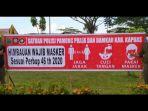satpol-pp-dan-damkar-kapuas-pasang-spanduk-disiplin-prokes-covid-19.jpg