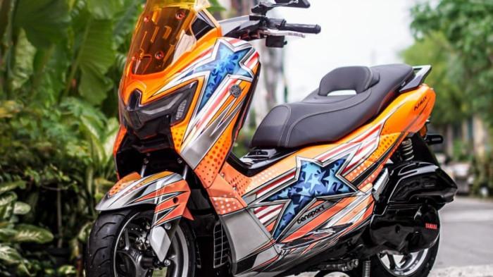 Suguhkan konsep balap supersport yang terinspirasi dari replika helm balap Jason DiSalvo, pembalap asal Amerika Serikat yang pernah bersinar bersama Yamaha di kejuaraan AMA Supersport Daytona 2004 di motor NMax Turbo  Rifky Hidayat, owner dari Nakano Garage.