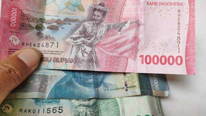 HEMAT DANA KAMPUNG - Lembaran kertas mata uang rupiah. Dana kampung untuk di Kabupaten Berau untuk tahun 2026 sudah dianggarkan Pemkab. Pihak pemerintah desa harus efisiensi, di antaranya pangkas penggunaan untuk perjalanan dinas hingga konsumsi. 