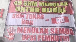 20240123_spanduk-penolakan-di-pasar-pagi.jpg