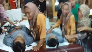 20240319_Keluarga-menangisi-Marhan-Harahap.jpg