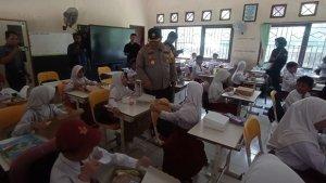 20241104_Polres-Kukar-bagi-makanan-bergizi.jpg