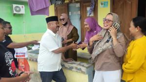 20241105_Edi-Damansyah-Tetap-Blusukan-meski-Diguyur-Hujan.jpg