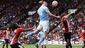 Erling-Haaland-melompat-untuk-mencetak-gol-untuk-Manchester-City-vs-Sheffield-United.jpg