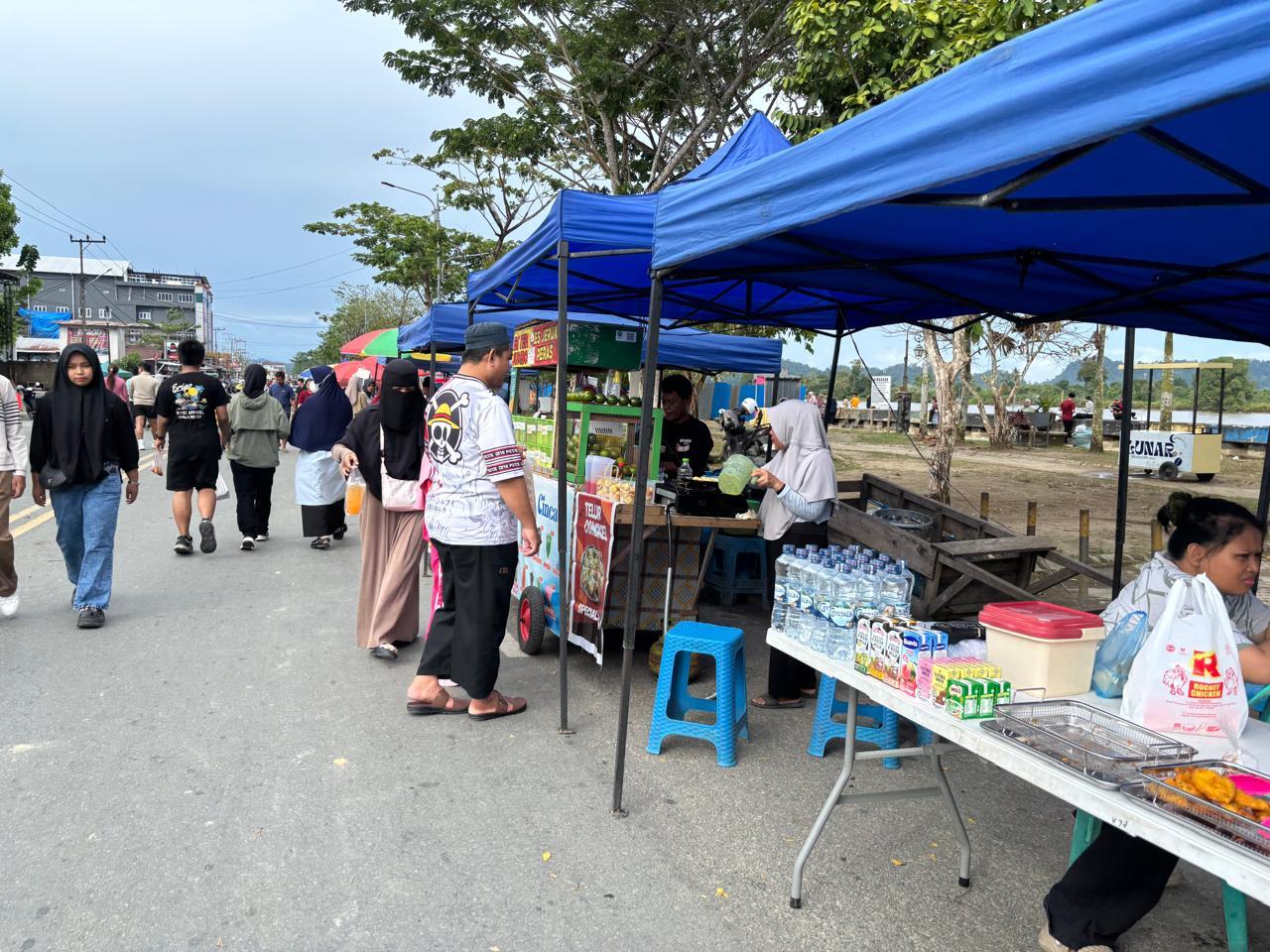 20260614_Pelaku-UMKM-setiap-minggu-pagi-menjajakan-dagangannya-di-CFD-Tepian-Sungai-Kayan.jpg