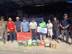 20230625_-Gamalis-saat-menyalurkan-bantuan-sosial-kepada-korban-kebakaran.jpg
