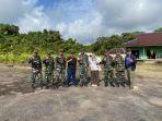 20231223_AM-Putut-Prabantoro-bersama-sejumlah-personel-TNI-di-Apau-Kayan.jpg