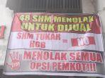 20240123_spanduk-penolakan-di-pasar-pagi.jpg