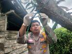 20240204_Polisi-melepas-tali-yang-menggantung.jpg