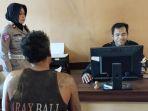 20240327_Sopir-truk-kontainer-Andi-Suryanto-saat-menjalani-pemeriksaan-oleh-pihak-kepolisian.jpg