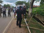 20241010_Bawaslu-bersama-Satpol-PP-Kutai-Timur-saat-menertibkan-APK.jpg
