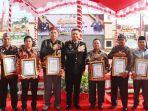 HUT ke-79 Bhayangkara, Polres Kubar Berikan Penghargaan kepada Personel dan Tokoh Masyarakat