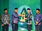 Bupati-Paser-Fahmi-Fadli-saat-menutup-secara-resmi-pelaksanaan-Musabaqah-Tilawatil-Quran-MTQ.jpg