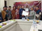 Edy-Triyono-Sumartadi-bersama-KH-Masrur-resmi-saat-mendaftar-Pilkada-Berau.jpg