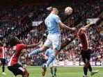 Erling-Haaland-melompat-untuk-mencetak-gol-untuk-Manchester-City-vs-Sheffield-United.jpg