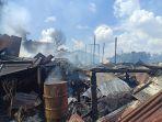 Hampir-dua-jam-pemadaman-api-berhasil-melahap-8-bangunan.jpg