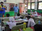 Relawan-Pertamina-Energi-Negeri-saat-sosialisasi-di-SD-Balikpapan.jpg