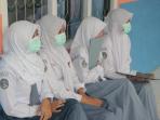 bulungan_siswi-kenakan-masker_20151019_172415.jpg